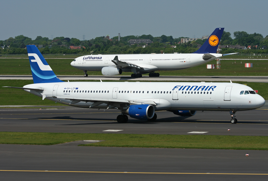 OH-LZF der Finnair rollt zur 23L @ DUS am 24.05.2010