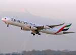 Dusseldorf - DUS/45163/emirates-airbus-a340-313x-take-off-rwy Emirates Airbus A340-313X take off rwy 23L in DUS am 19.12.09