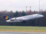 CRJ 200 Lufthansa City Line, Bombardier CRJ200 LR, D-ACJG auf dem Hamburger Flughafen. Aufgenommen am 13.12.09.