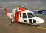 K�ln Sikorsky S-76A mit der Seriennummer c/n 760282, welche fr�her im SAR-Dienst der Schweden unter der Reg. SE-JUZ flog . Daher die bis heute erhaltene Livery ( obwohl die Maschine fr�her mal auch eine blau-weisse Lackierung hatte ) . Aufgenommen in CGN am 18.2.2010